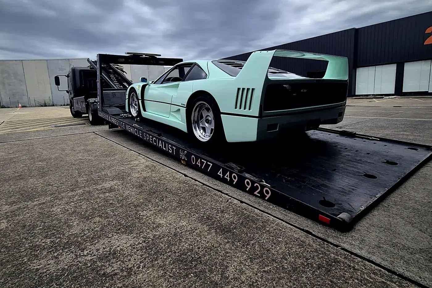 Mint green Ferrari F40 loaded on Haul King's branded tray in Sydney