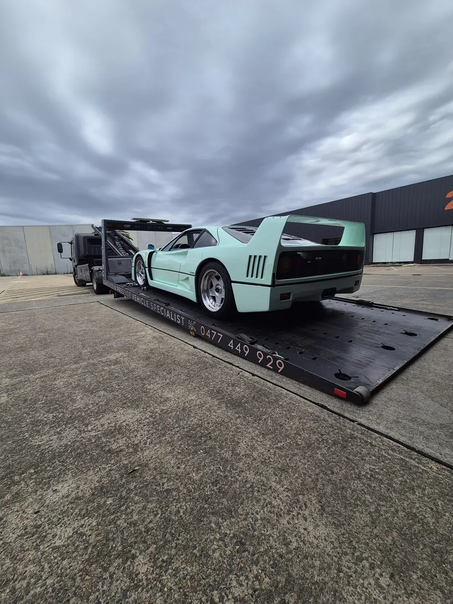Ferrari F40 boarding a low-angle tray