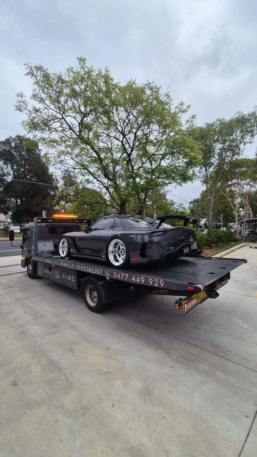 Single-seater race car loaded on Haul King's tray in Sydney