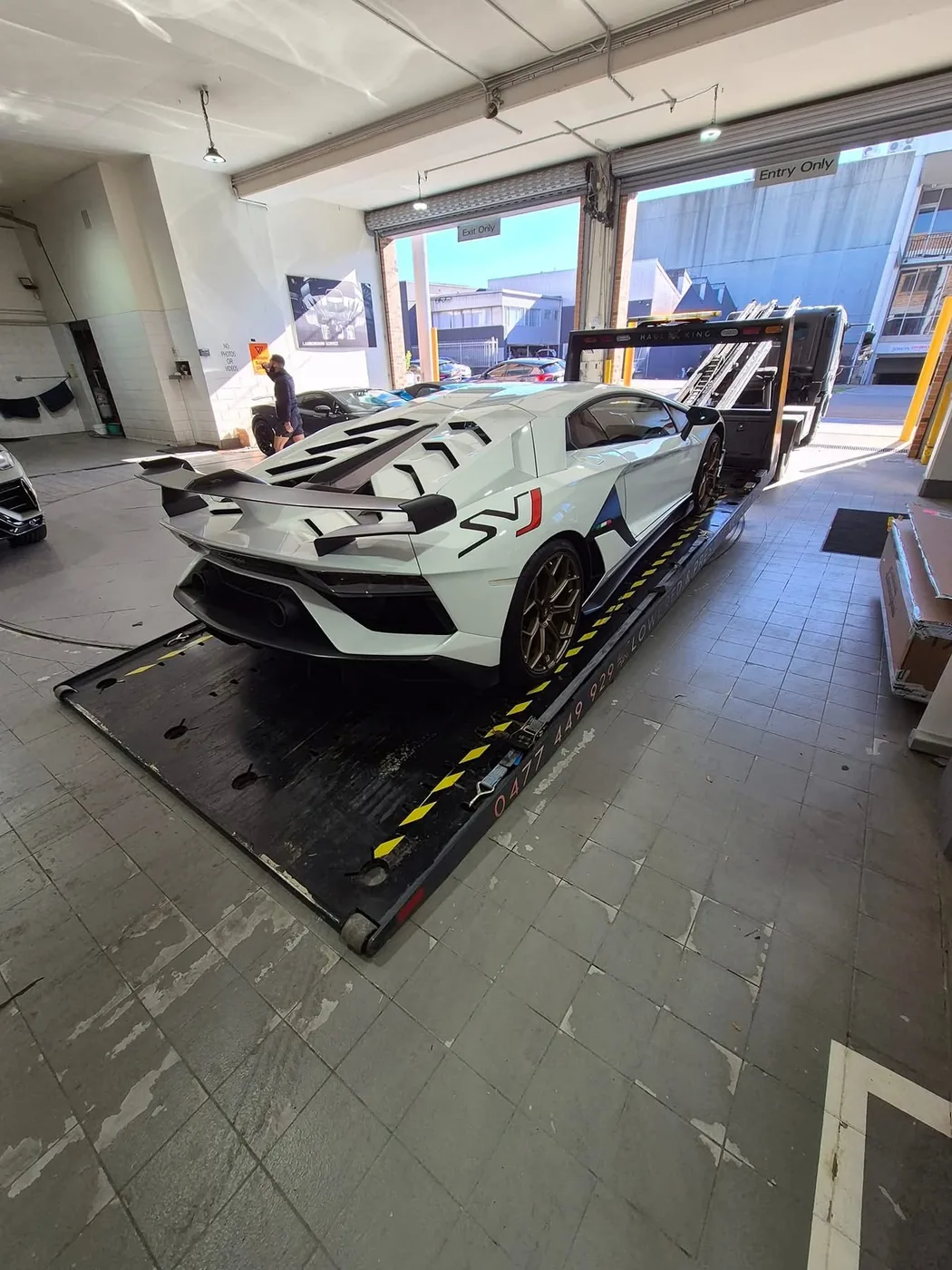 Showroom delivery loaded on Haul King's tray in Sydney