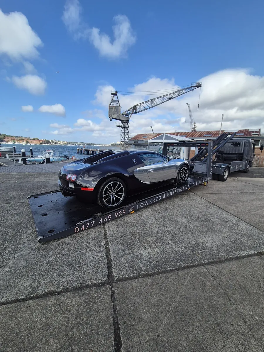 Bugatti Veyron on the tray, Sydney Harbour behind