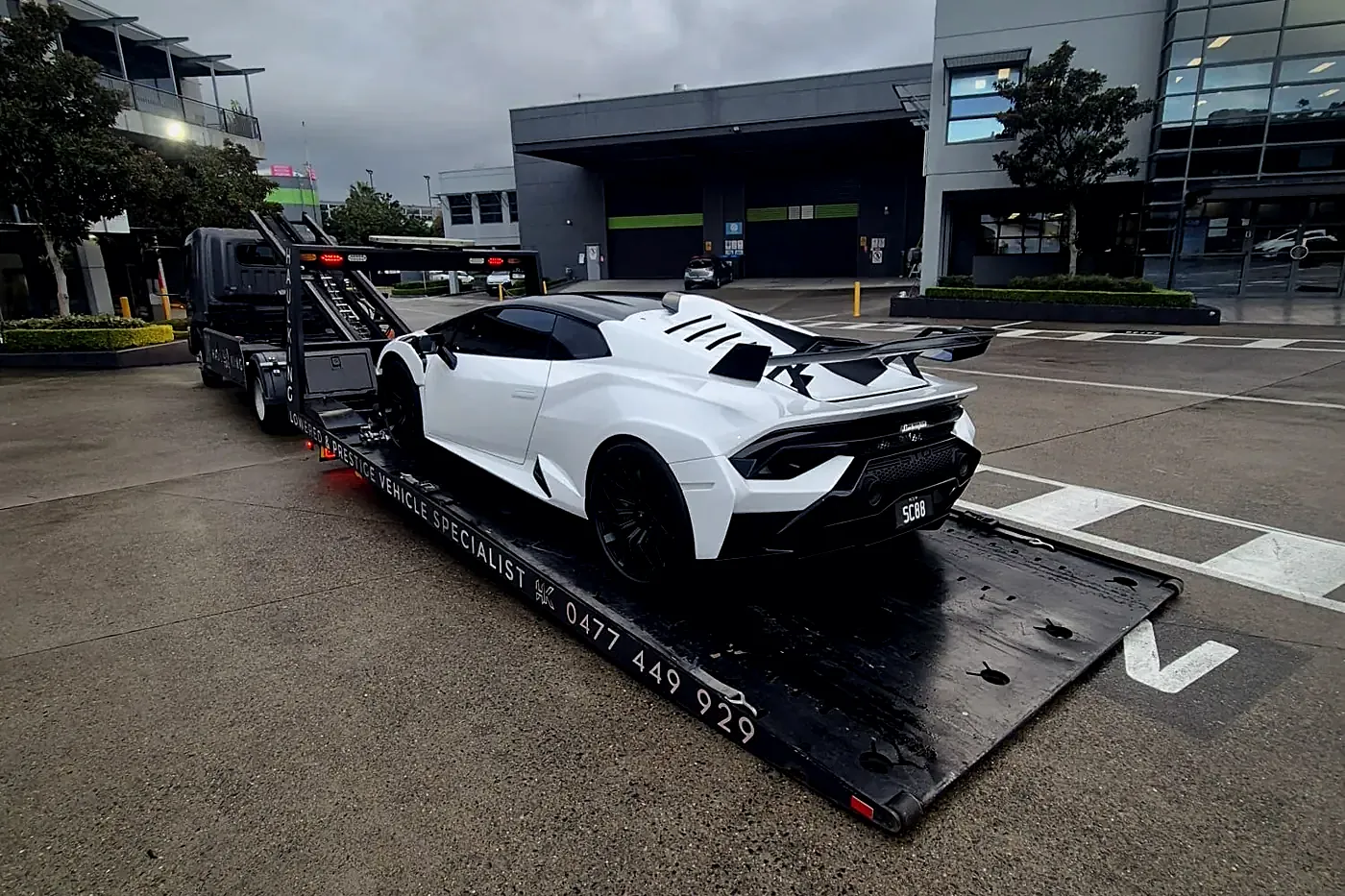 White Lamborghini Huracán on Haul King's low-entry tray in Sydney