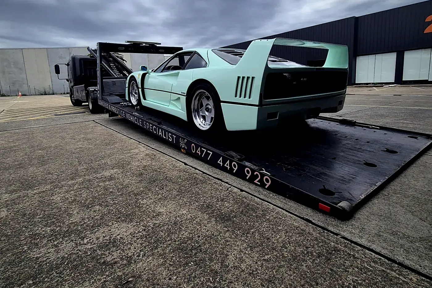 Mint green Ferrari F40 on Haul King's tray, Lowered & Prestige Vehicle Specialist livery