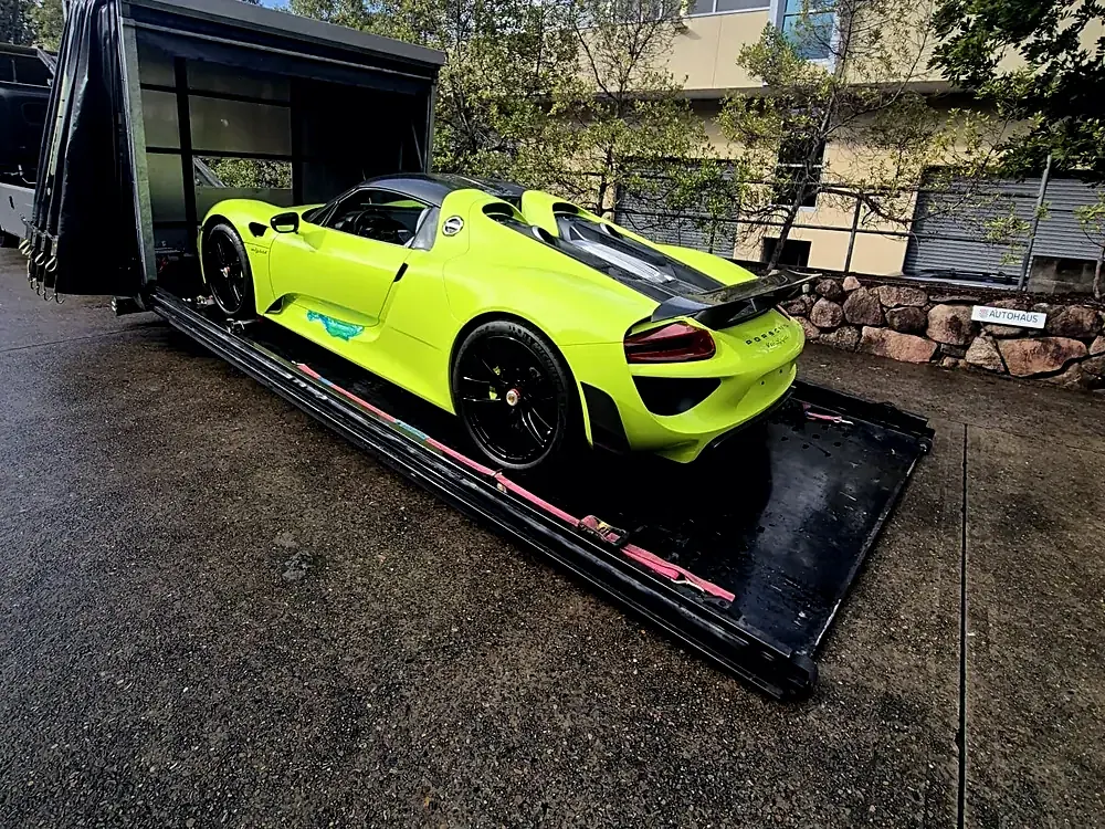 Lime-green supercar loaded inside Haul King's enclosed body